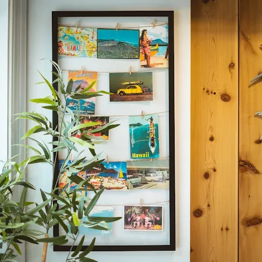 A welcoming display of photographs from hawaii, available for your viewing right through our door