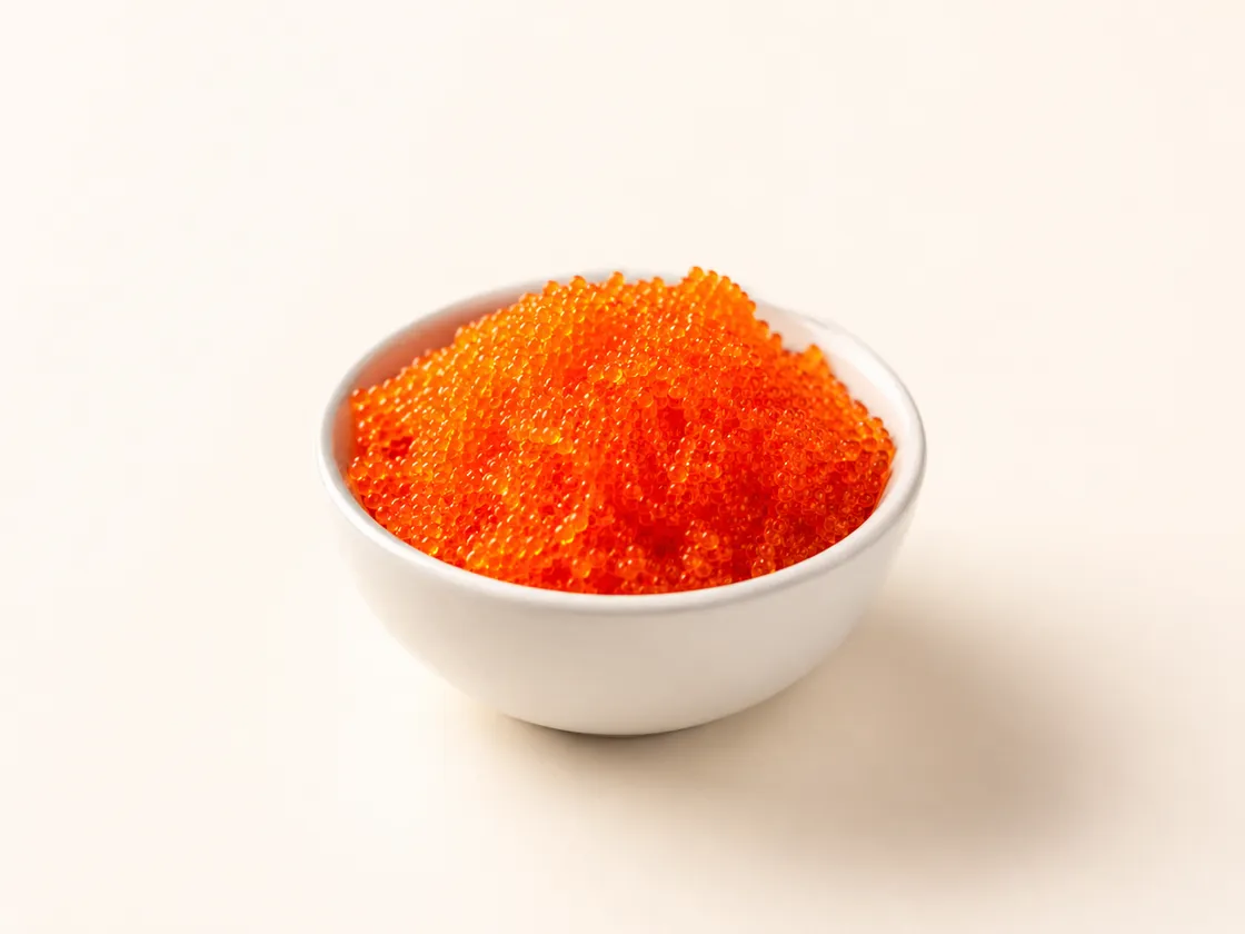 A small bowl of orange tobiko